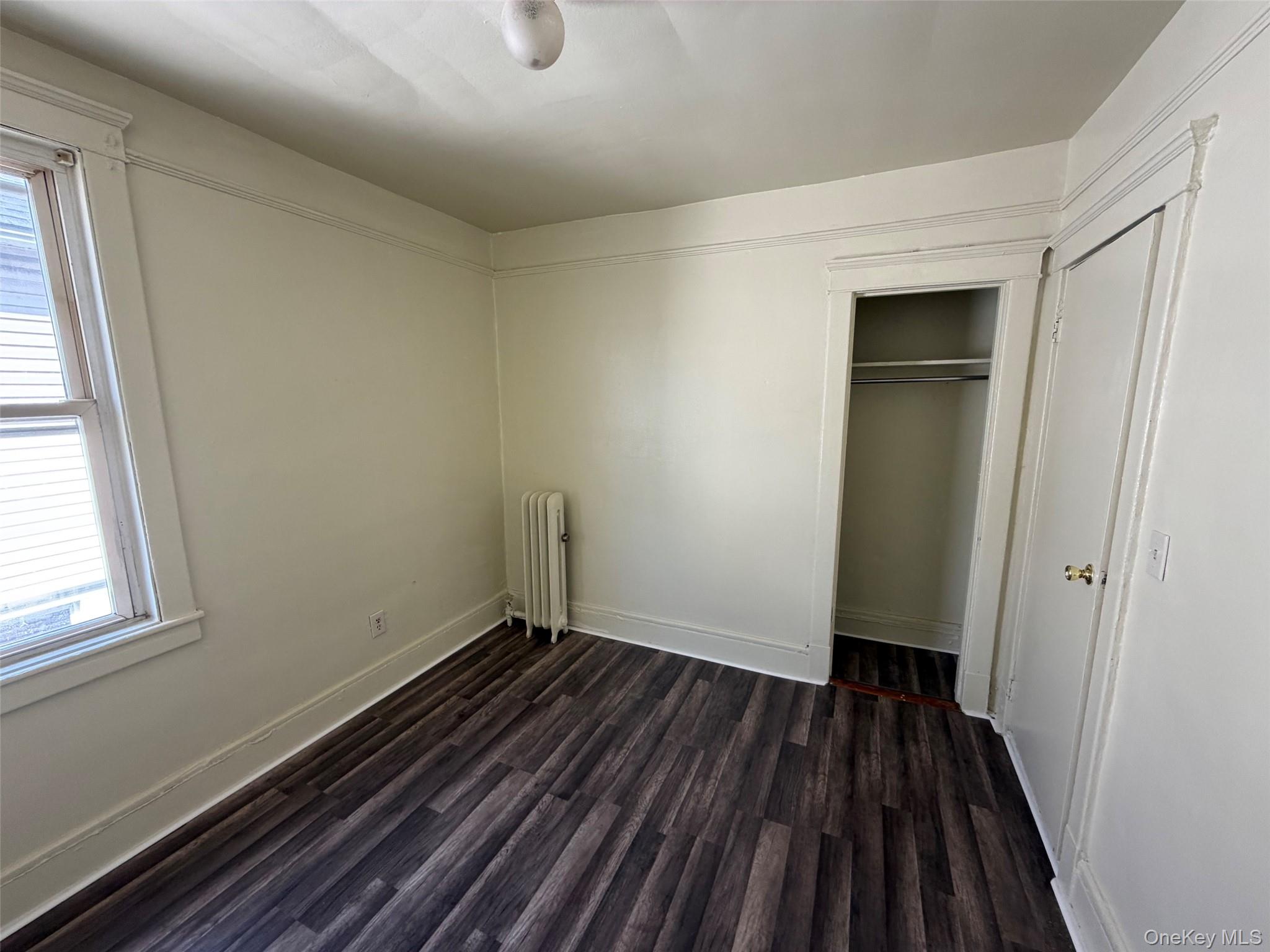 2941 Middletown Road Bronx, NY 10461 - Photo 16 of 31 a view of a room with wooden floor and window