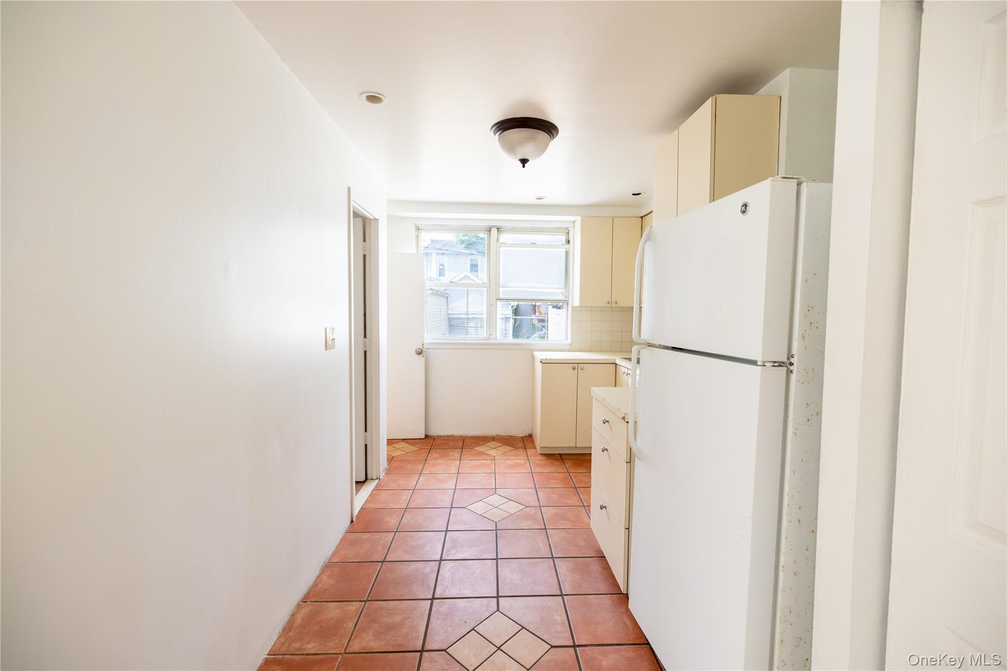 2941 Middletown Road Bronx, NY 10461 - Photo 7 of 31 a kitchen with a refrigerator a sink and dishwasher