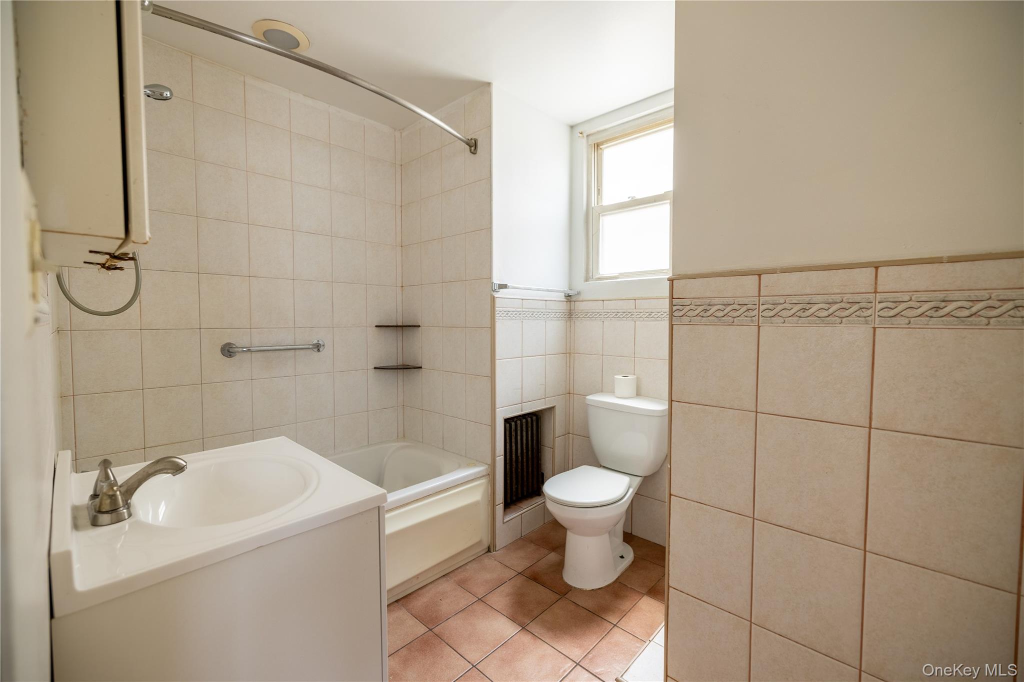 2941 Middletown Road Bronx, NY 10461 - Photo 9 of 31 a bathroom with a sink toilet and shower