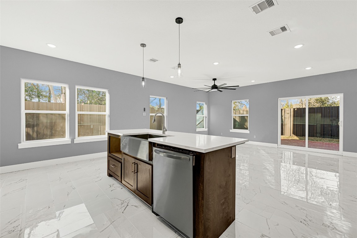 6605 Apollo Street Houston, TX 77091 - Photo 11 of 32 a kitchen with sink and window