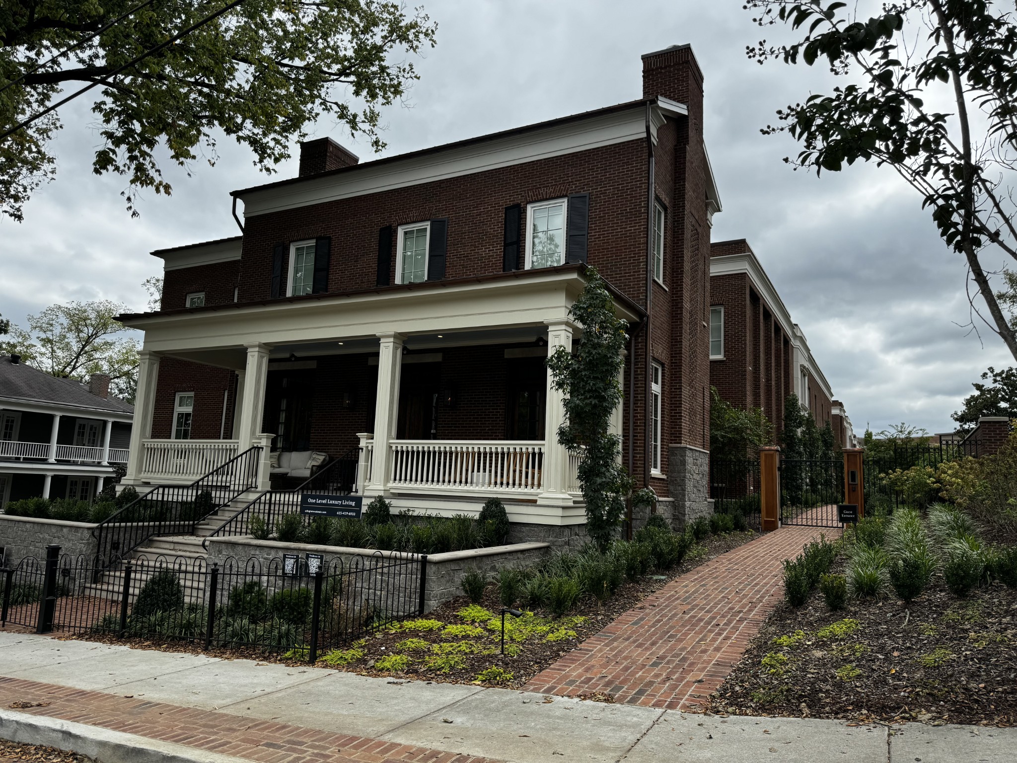 a front view of a house with yard