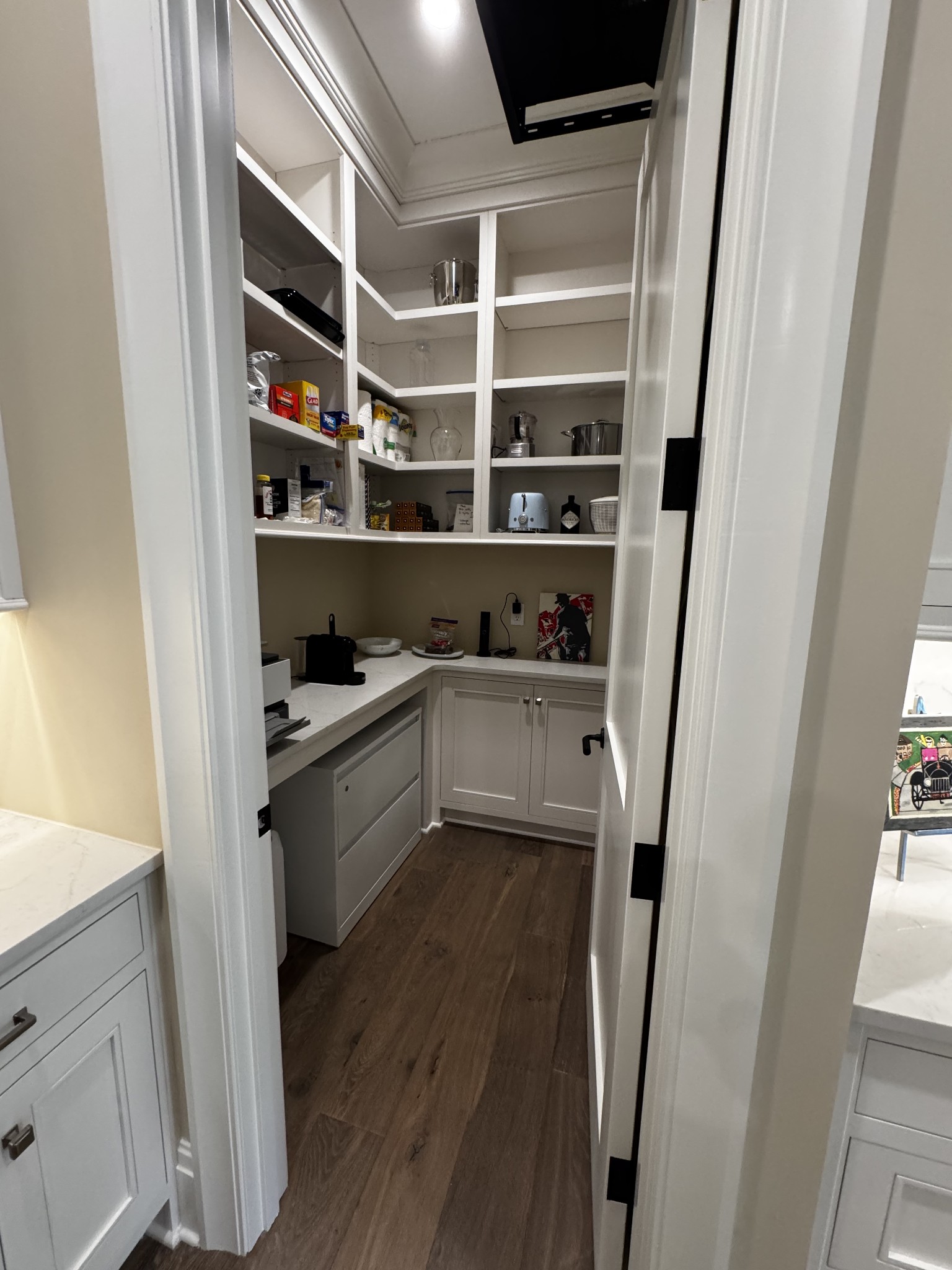 725 West Main Street, Unit 101 Franklin, TN 37064 - Photo 3 of 8 a kitchen with granite countertop a refrigerator and a sink