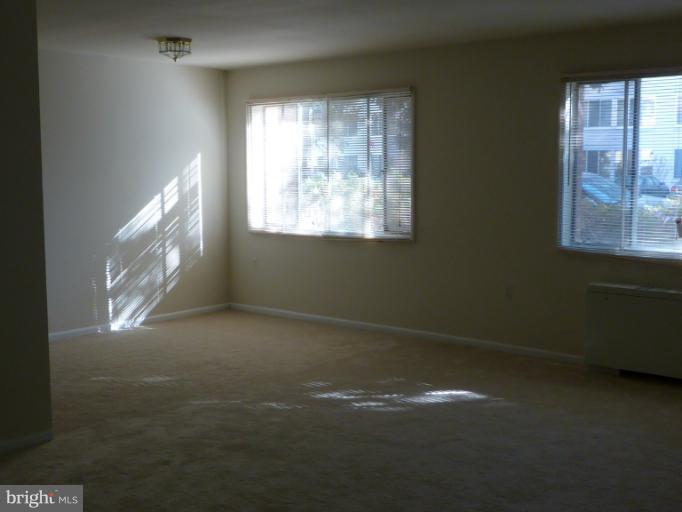 1200 South Arlington Ridge Road, Unit 315 Arlington, VA 22202 - Photo 6 of 12 a view of empty room with window
