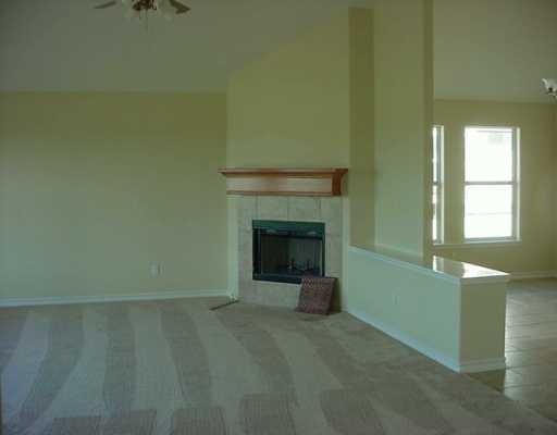 6502 Samba Drive Corpus Christi, TX 78414 - Photo 2 of 7 a view of a livingroom with a fireplace