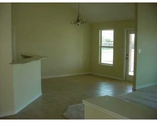 a view of a room with a window