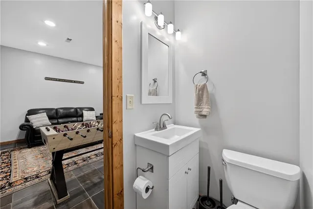 a view of storage and utility room with washer and dryer