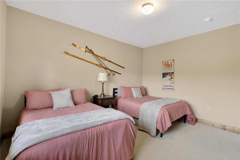 116 Lakeside Trail Champion, PA 15622 - Photo 35 of 44 a bedroom with two beds and a couch