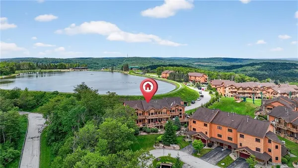 a view of a city street with a lake view