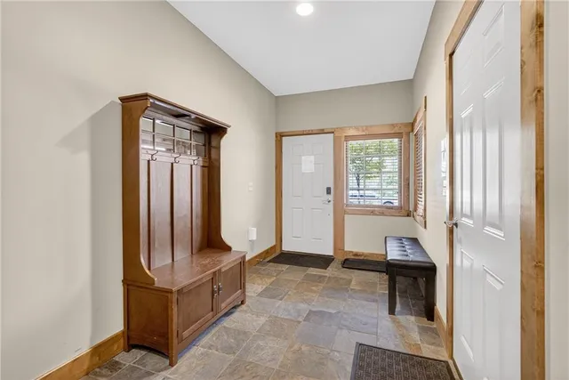 a view of a hallway with staircase