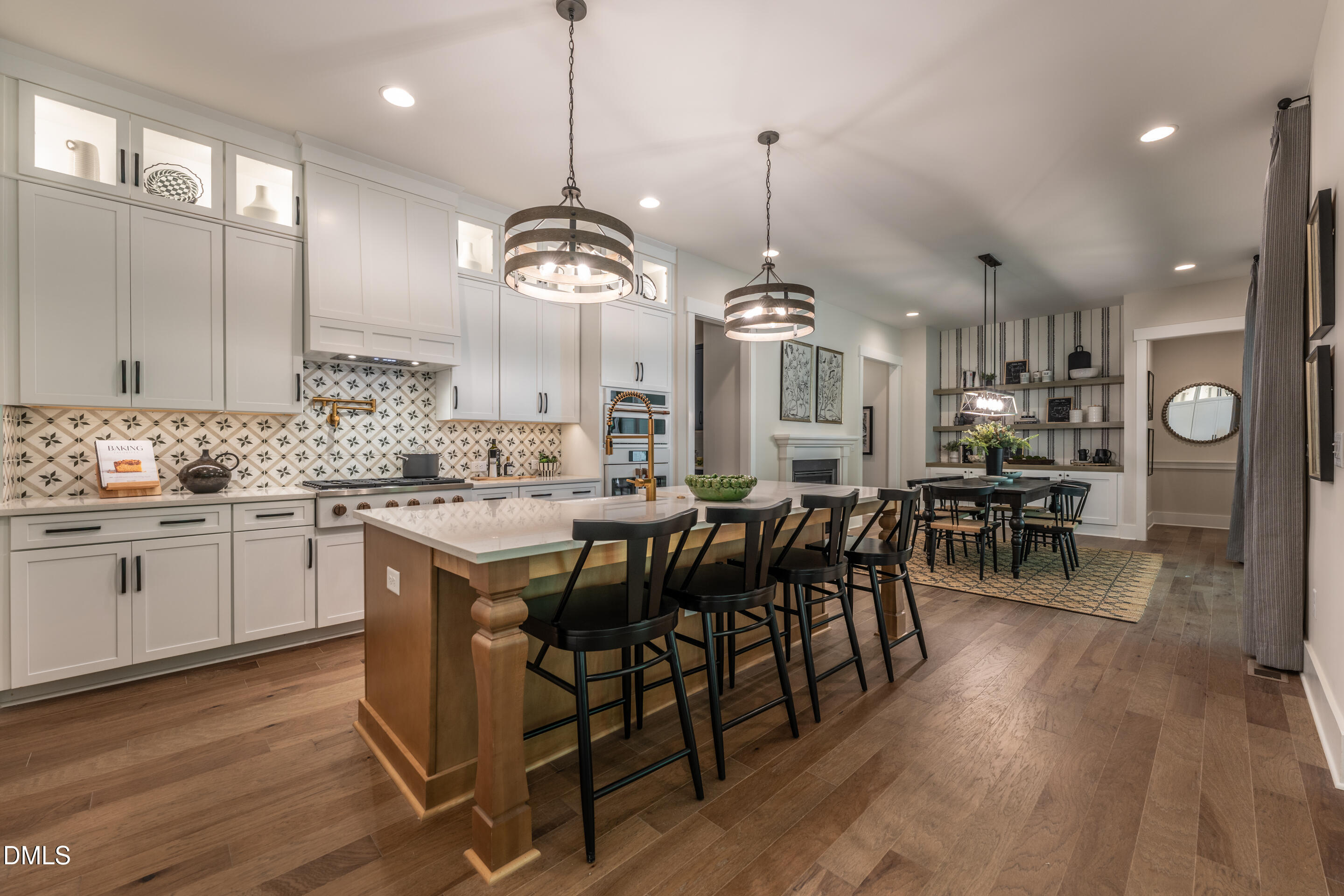 247 Ivy Rdg Road Chapel Hill, NC 27516 - Photo 17 of 70 a large kitchen with a table and chairs