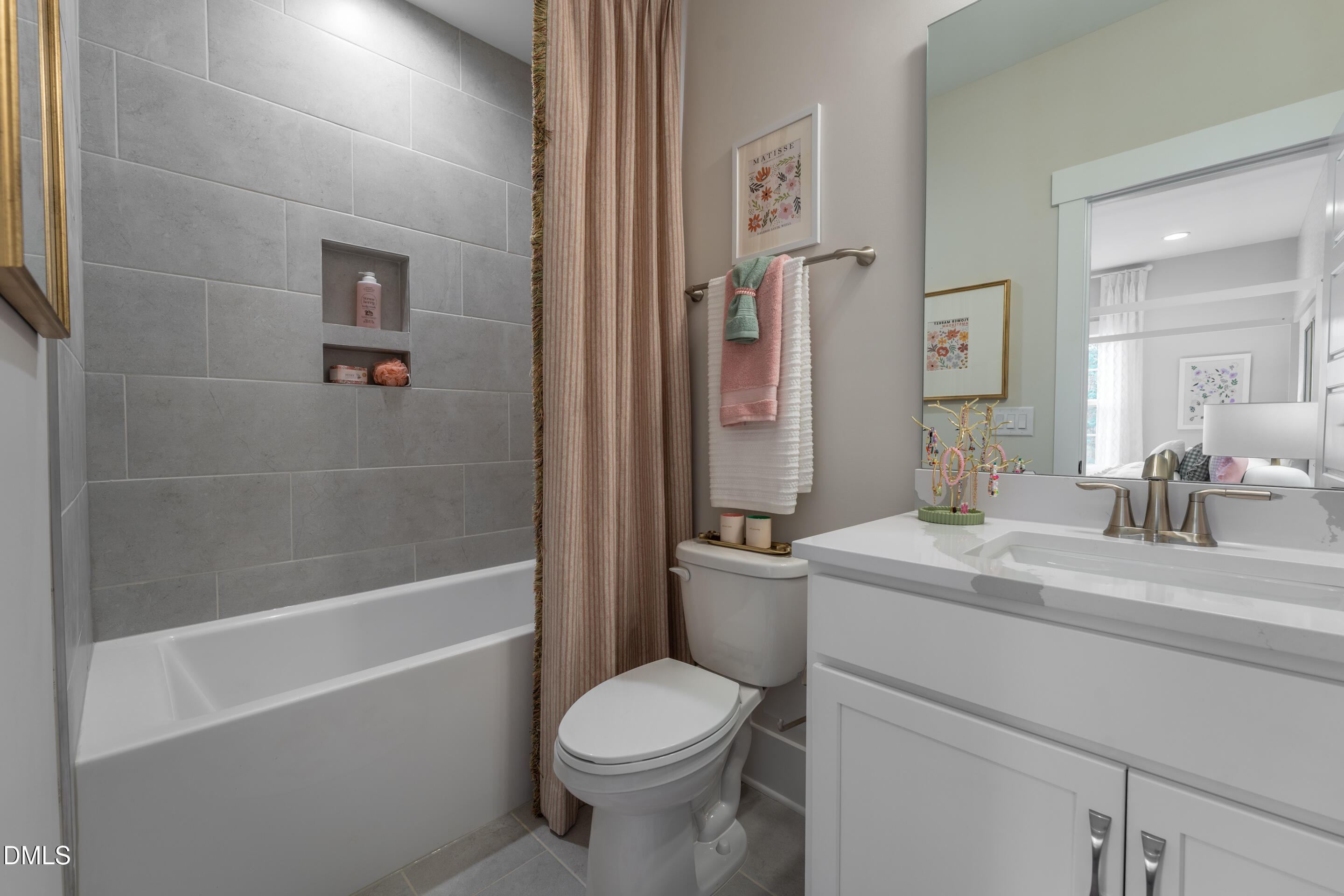 247 Ivy Rdg Road Chapel Hill, NC 27516 - Photo 45 of 70 a bathroom with a sink toilet vanity and shower