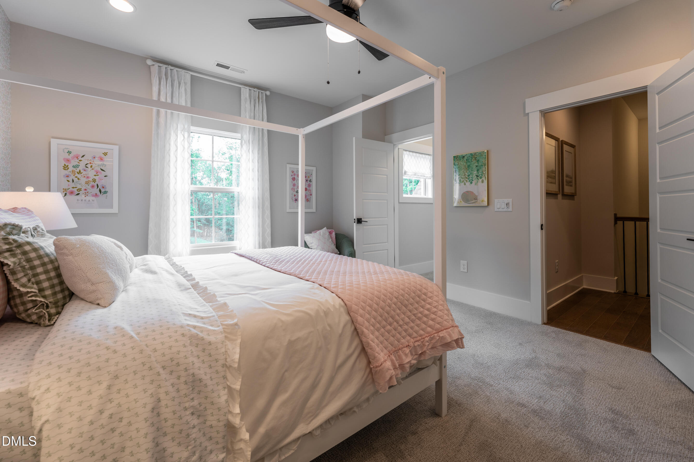 247 Ivy Rdg Road Chapel Hill, NC 27516 - Photo 46 of 70 a bedroom with a bed and a window