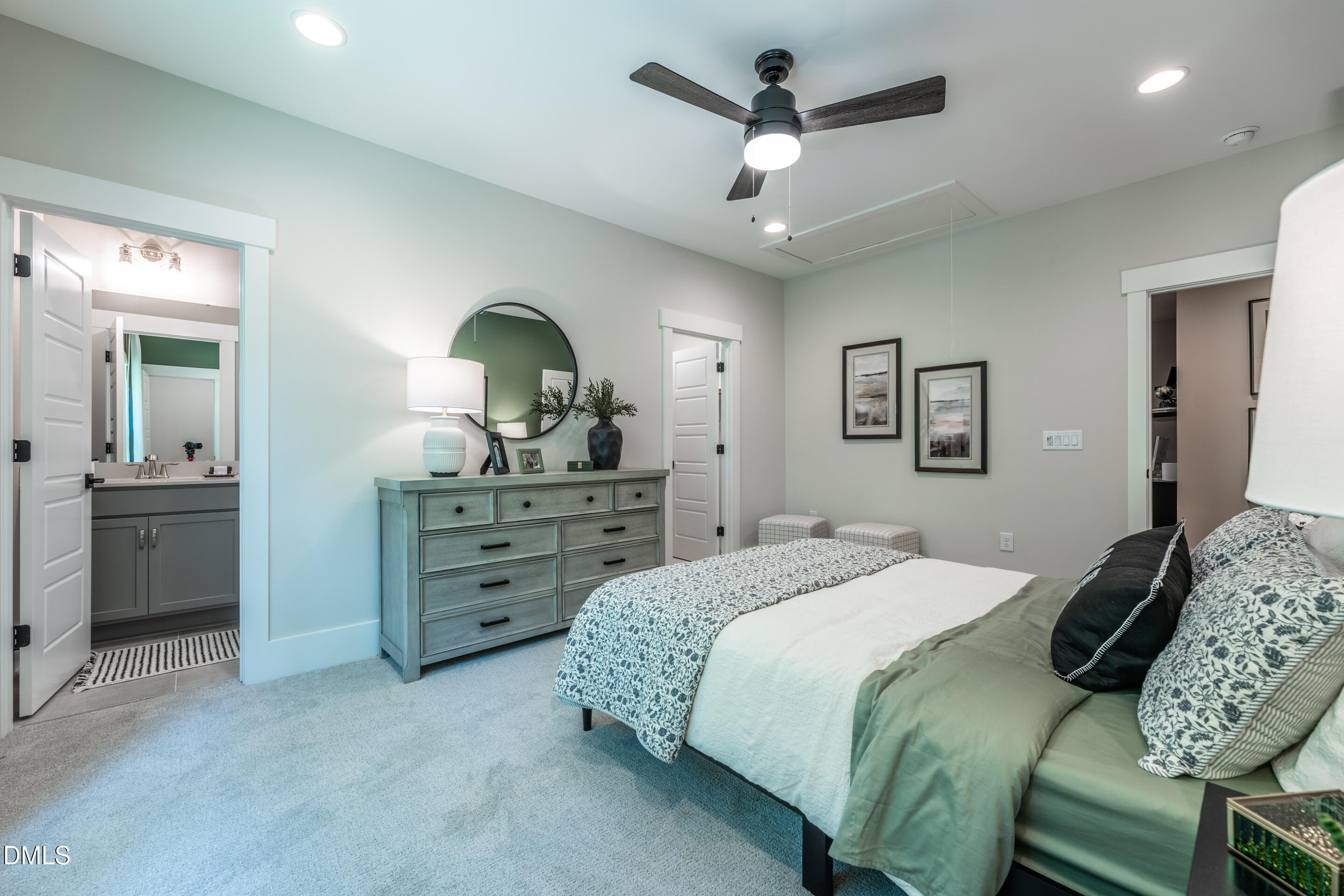 247 Ivy Rdg Road Chapel Hill, NC 27516 - Photo 52 of 70 a bedroom with a bed and a chandelier