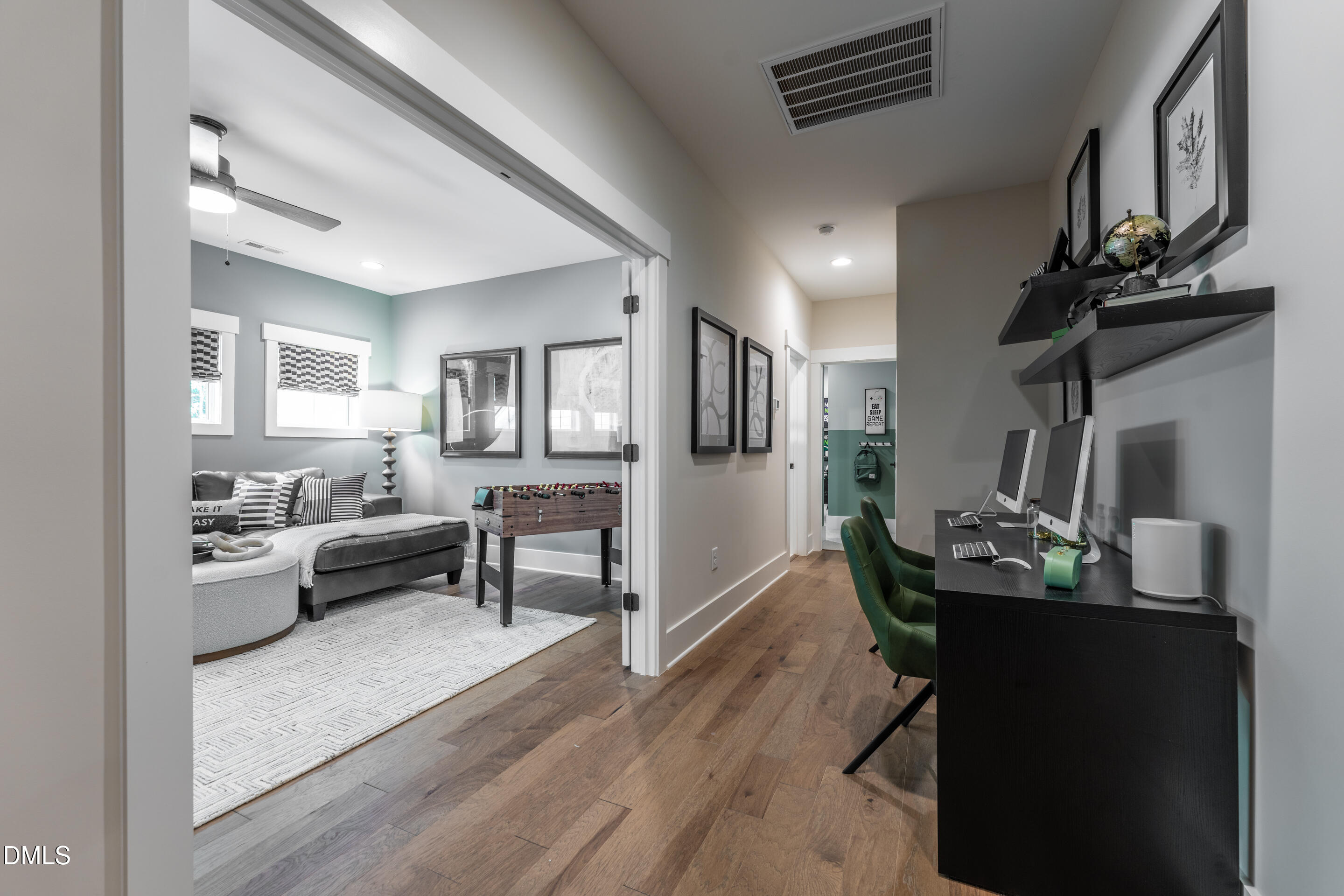 247 Ivy Rdg Road Chapel Hill, NC 27516 - Photo 53 of 70 a living room with furniture and a wooden floor