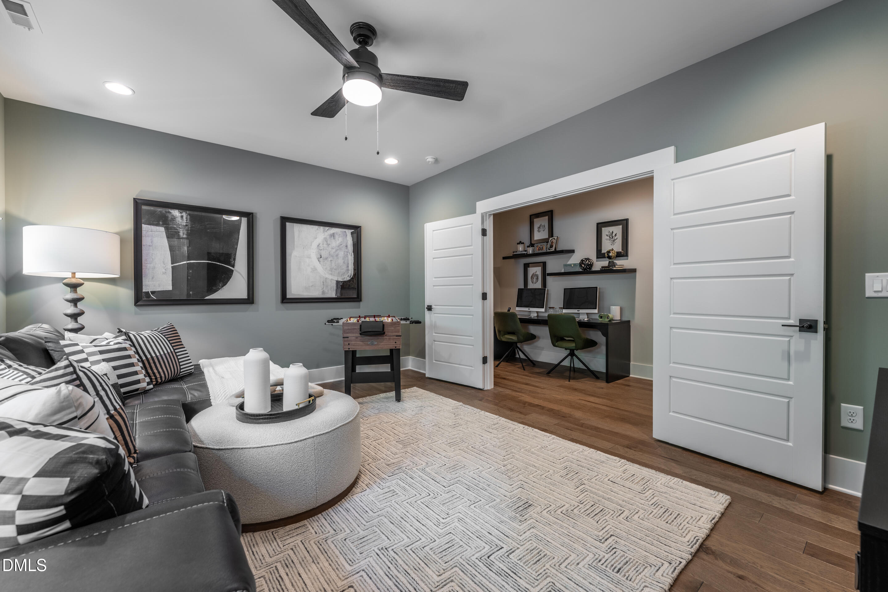 247 Ivy Rdg Road Chapel Hill, NC 27516 - Photo 55 of 70 a living room with furniture and wooden floor