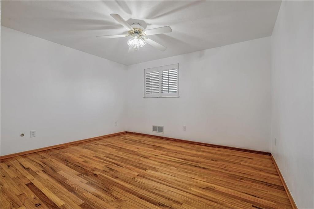 14190 Ridge Road Irwin, PA 15642 - Photo 25 of 49 a view of an empty room with wooden floor