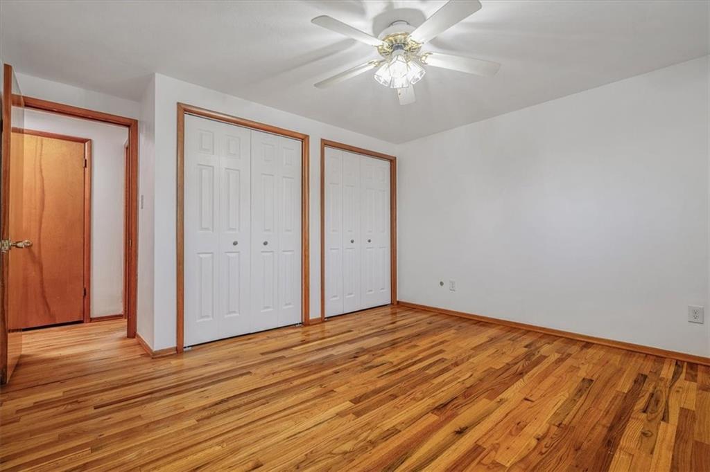 14190 Ridge Road Irwin, PA 15642 - Photo 26 of 49 a view of an empty room with wooden floor