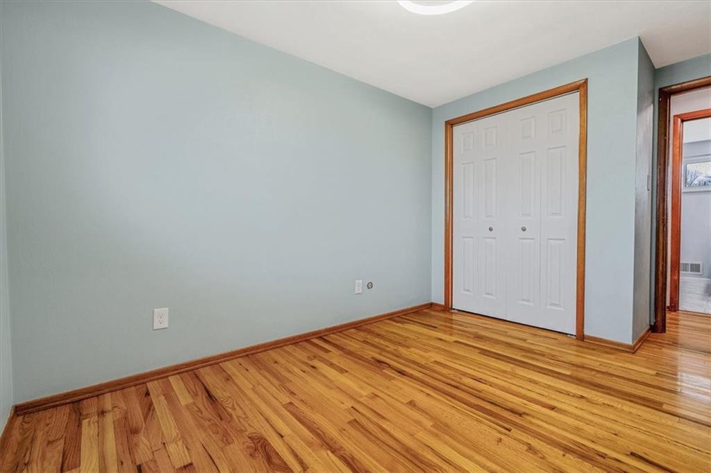 14190 Ridge Road Irwin, PA 15642 - Photo 28 of 49 a view of empty room with wooden floor