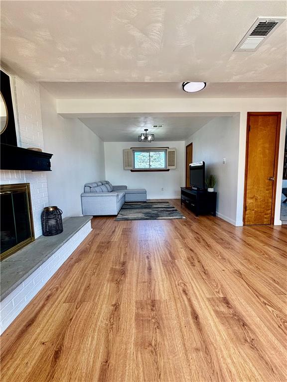 14190 Ridge Road Irwin, PA 15642 - Photo 30 of 49 a living room with a couch and a wooden floor