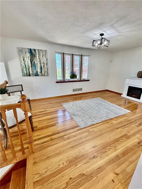 14190 Ridge Road Irwin, PA 15642 - Photo 9 of 49 a view of a bedroom with wooden floor and window