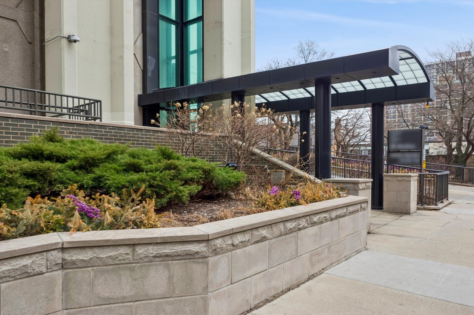 a view of a chairs and table in a patio