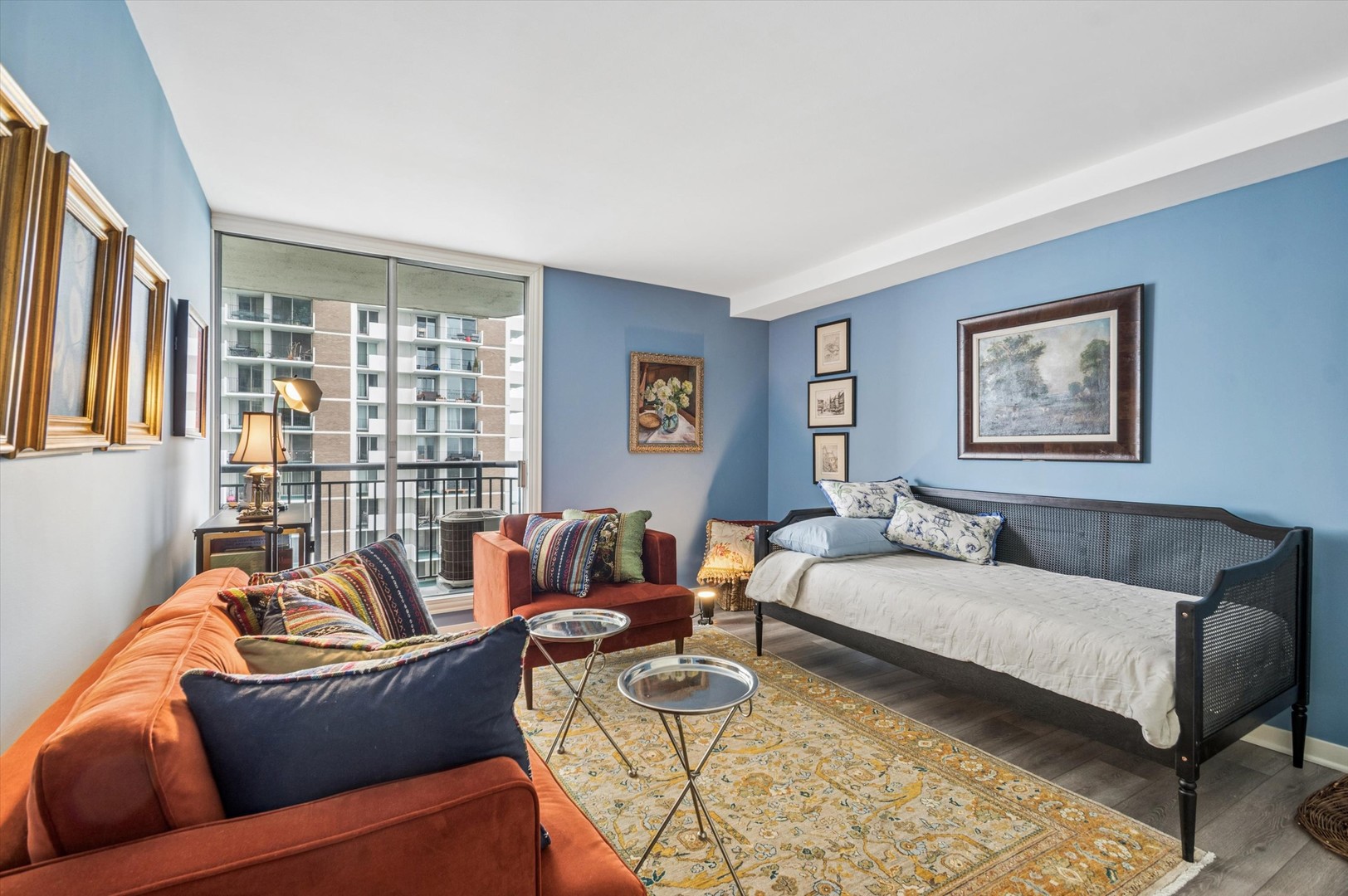 6007 North Sheridan Road, Unit 15B Chicago, IL 60660 - Photo 15 of 18 a living room with furniture and a window