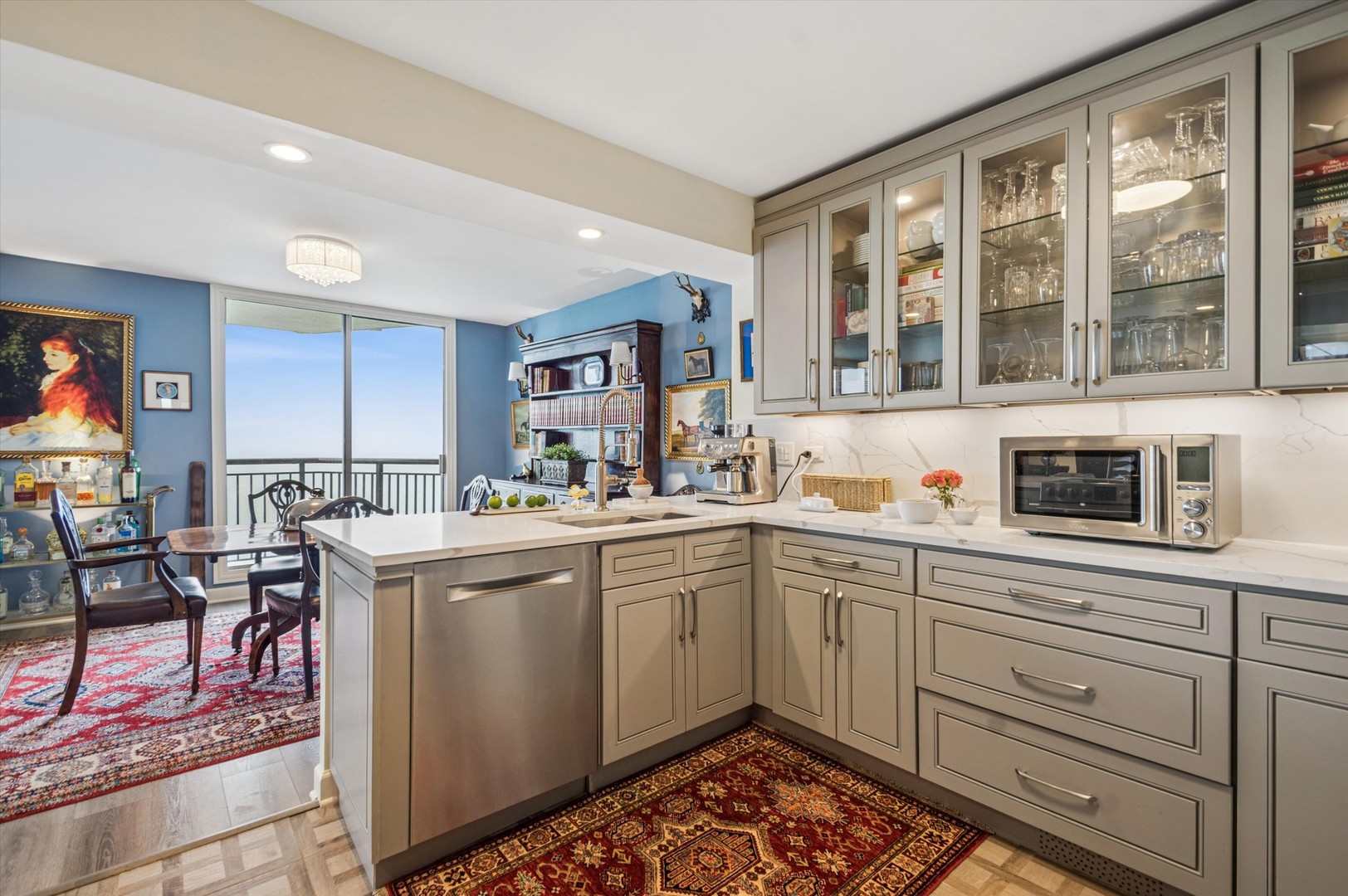 6007 North Sheridan Road, Unit 15B Chicago, IL 60660 - Photo 3 of 18 a kitchen with a stove a sink and a refrigerator