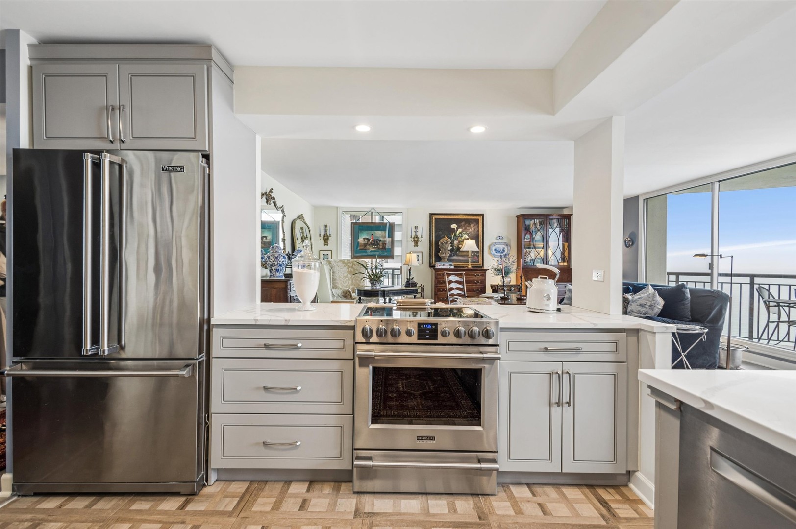 6007 North Sheridan Road, Unit 15B Chicago, IL 60660 - Photo 5 of 18 a kitchen with a stove sink and refrigerator