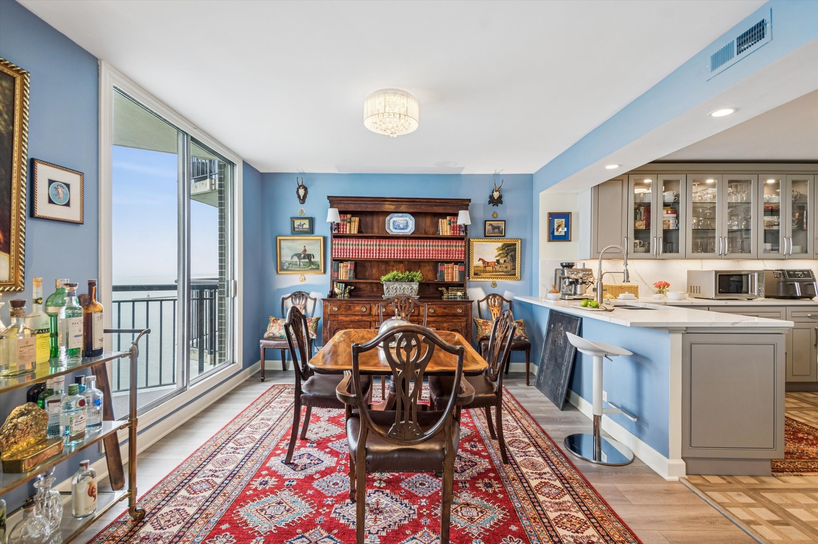 6007 North Sheridan Road, Unit 15B Chicago, IL 60660 - Photo 9 of 18 a view of a dining room with furniture and a rug