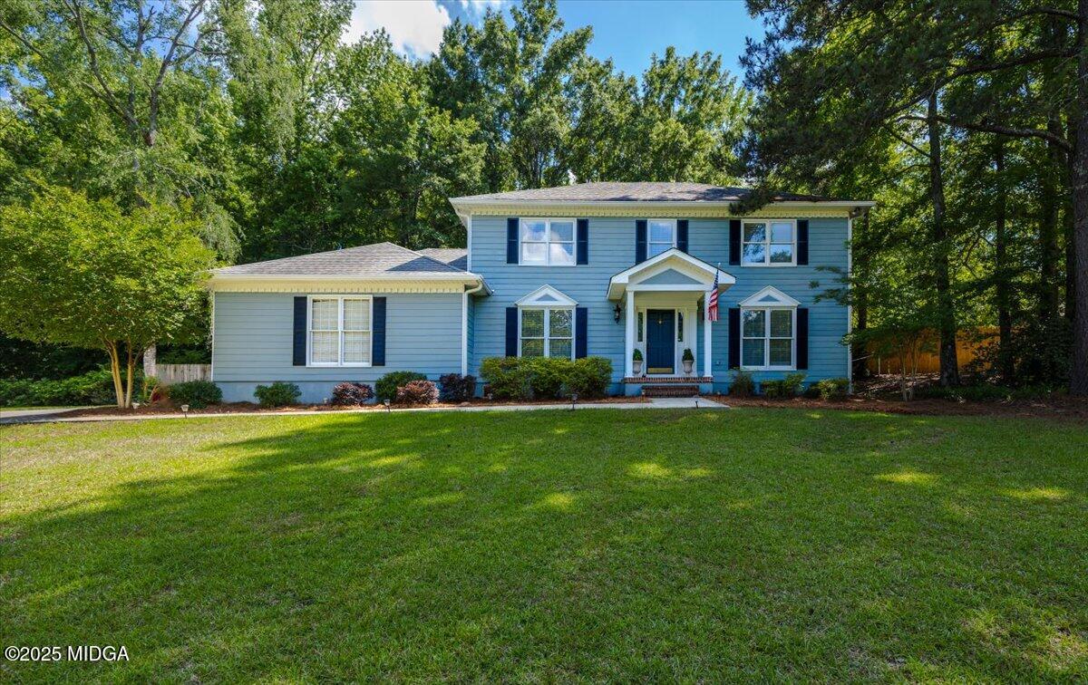 5262 White House Plantation Road Macon, GA 31210 - Photo 1 of 1 a front view of a house with a garden