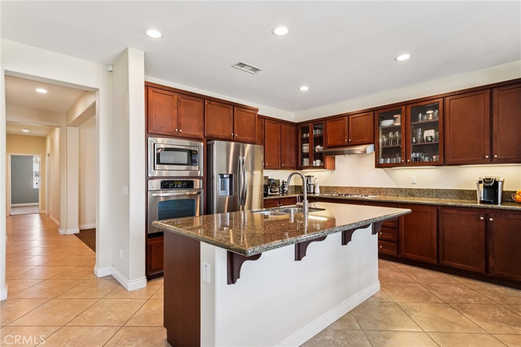 28552 Rustic Glen Street Menifee, CA 92584 - Photo 8 of 48 Open kitchen with generous counter space