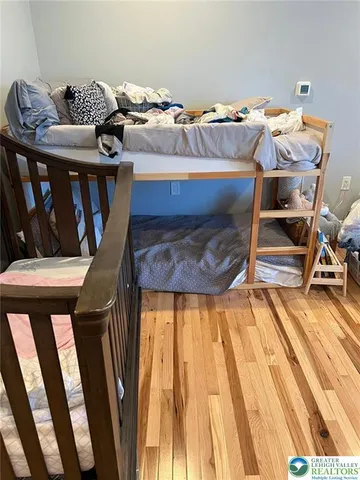 a view of walk in closet with clothes and water camper