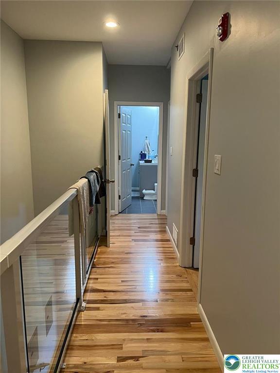 623 Walnut Street, Unit C2 Easton, PA 18042 - Photo 10 of 26 a view of a hallway with wooden floor and staircase