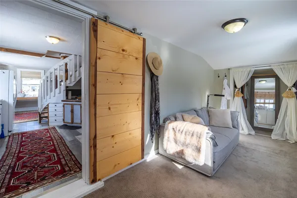 a bathroom with a shower curtain and a sink