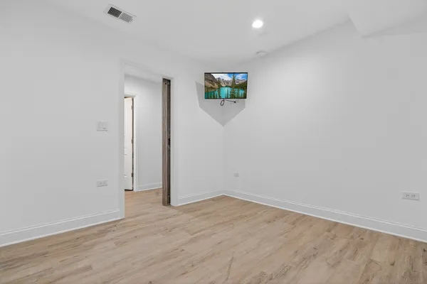 a view of a house with a parking space