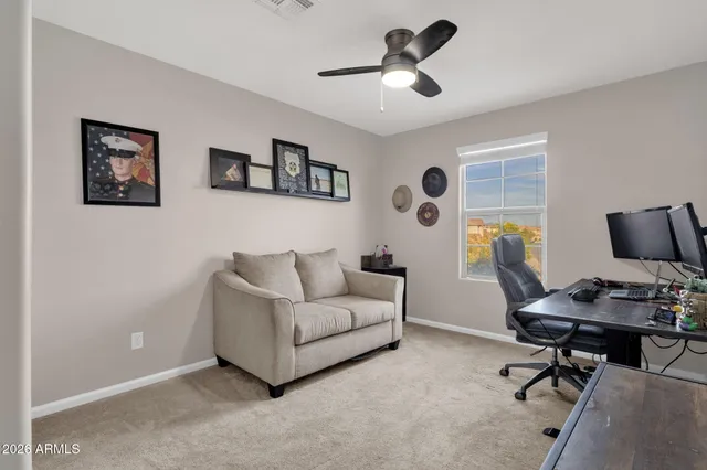 a view of a swimming pool with a lounge chair