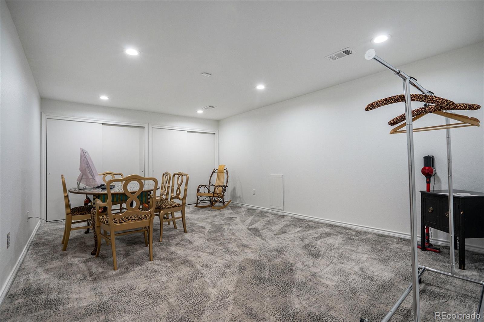 1600 South Quebec Way, Unit 10 Denver, CO 80231 - Photo 19 of 29 a view of a dining room with furniture