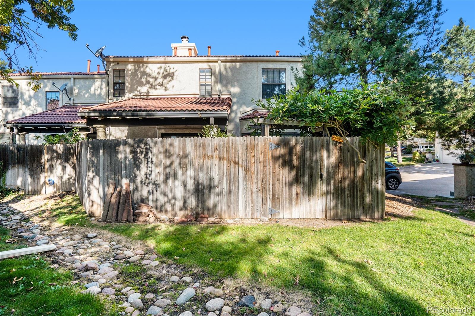 1600 South Quebec Way, Unit 10 Denver, CO 80231 - Photo 29 of 29 a view of outdoor space yard and patio