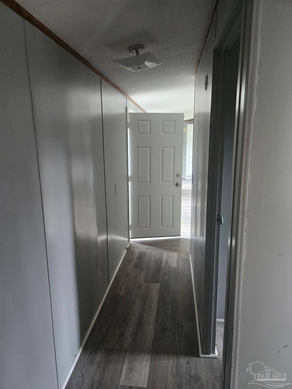 5675 Saufley Field Road, Unit 9 Pensacola, FL 32526 - Photo 10 of 15 a view of wooden floor