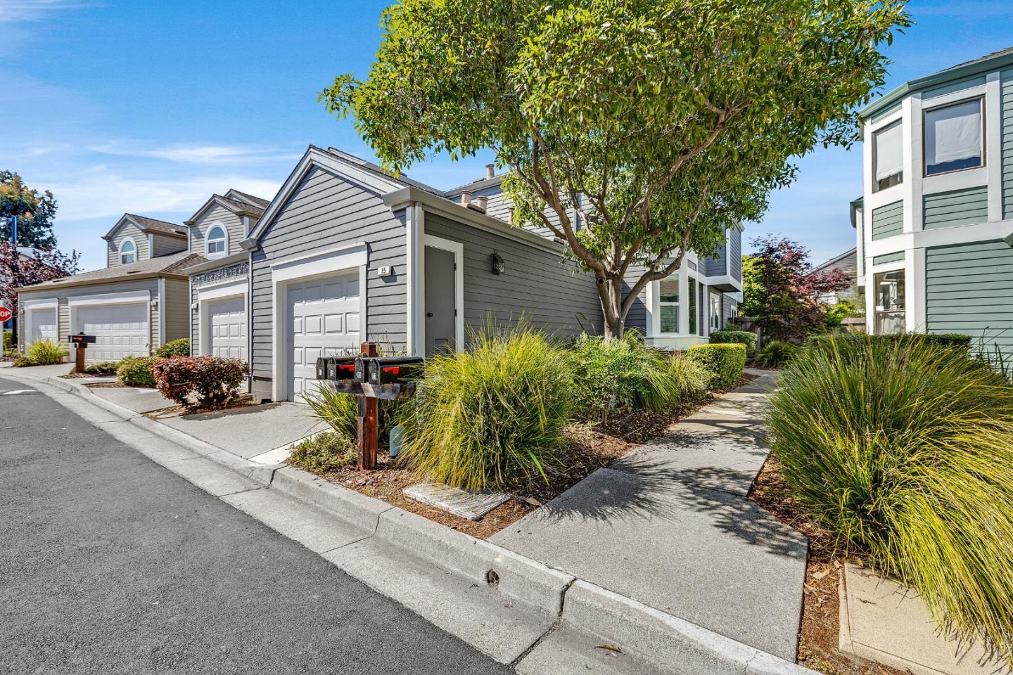 15 Parfait Lane Alameda, CA 94502 - Photo 3 of 35 a front view of a house with garden
