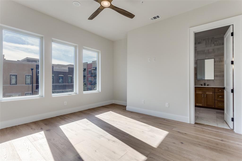 250 East Dallas Road, Unit 114 Grapevine, TX 76051 - Photo 19 of 33 a view of an empty room with a window