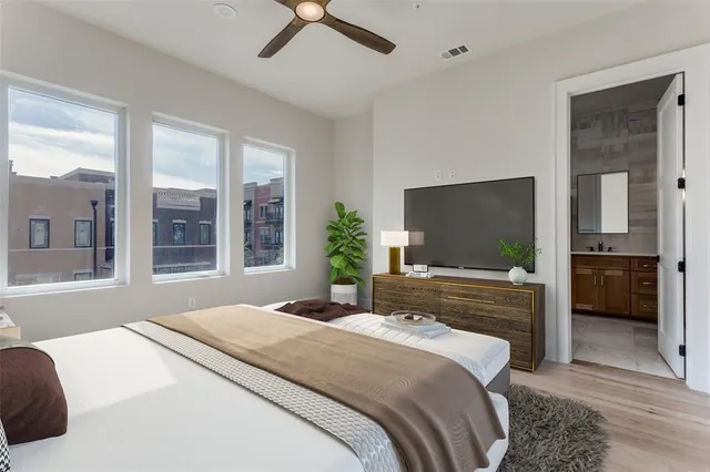 a spacious bathroom with a sink double vanity and a shower