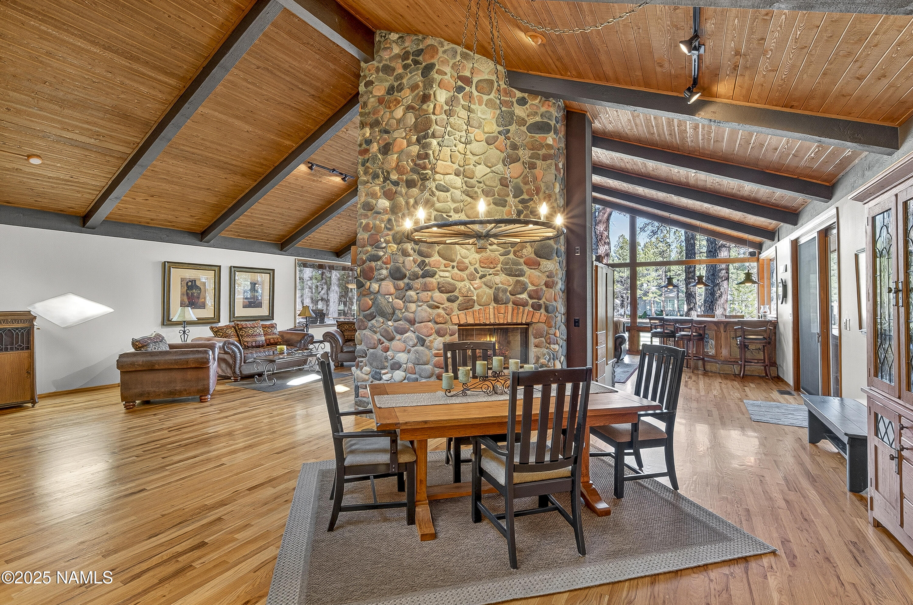 5790 Griffiths Spring Flagstaff, AZ 86005 - Photo 19 of 47 a dining room with furniture window and wooden floor