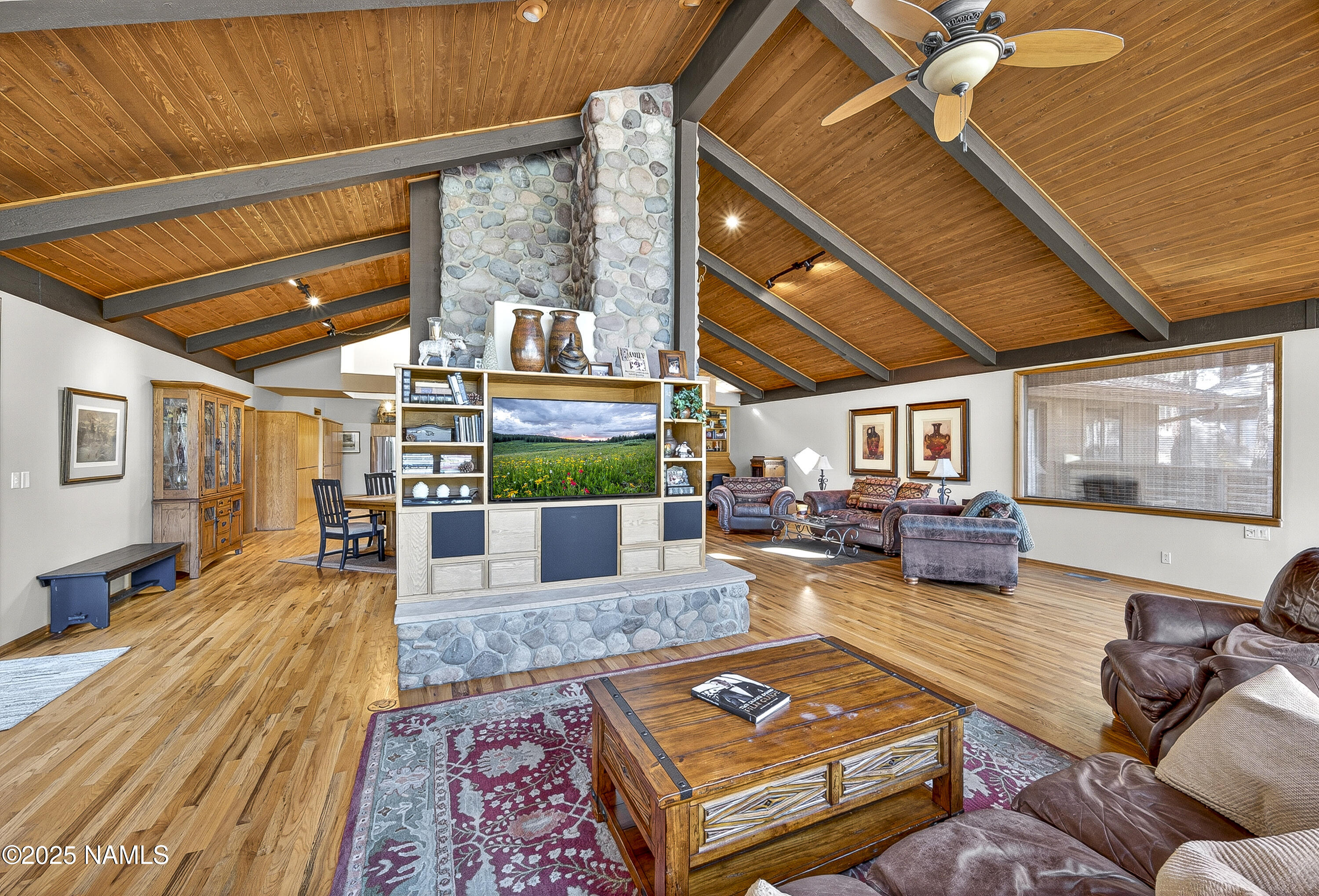 5790 Griffiths Spring Flagstaff, AZ 86005 - Photo 20 of 47 a living room with furniture and a wooden floor