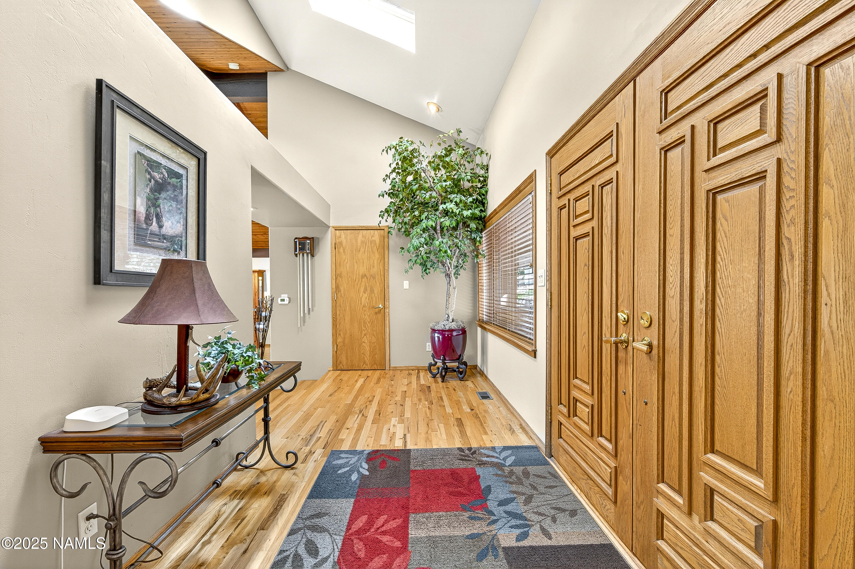 5790 Griffiths Spring Flagstaff, AZ 86005 - Photo 25 of 47 a bed room with a bed and a chair