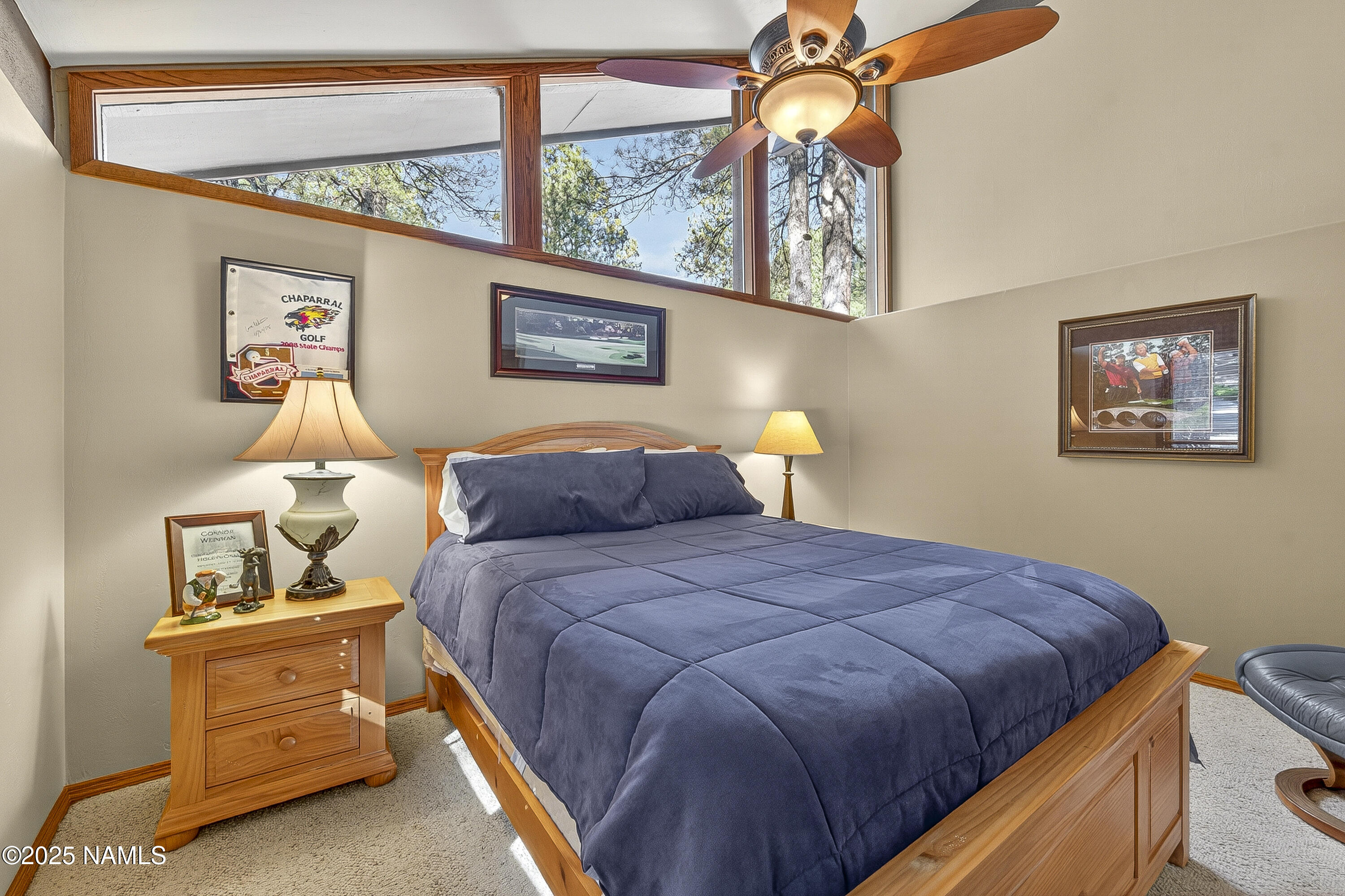 5790 Griffiths Spring Flagstaff, AZ 86005 - Photo 37 of 47 a bedroom with a bed and window