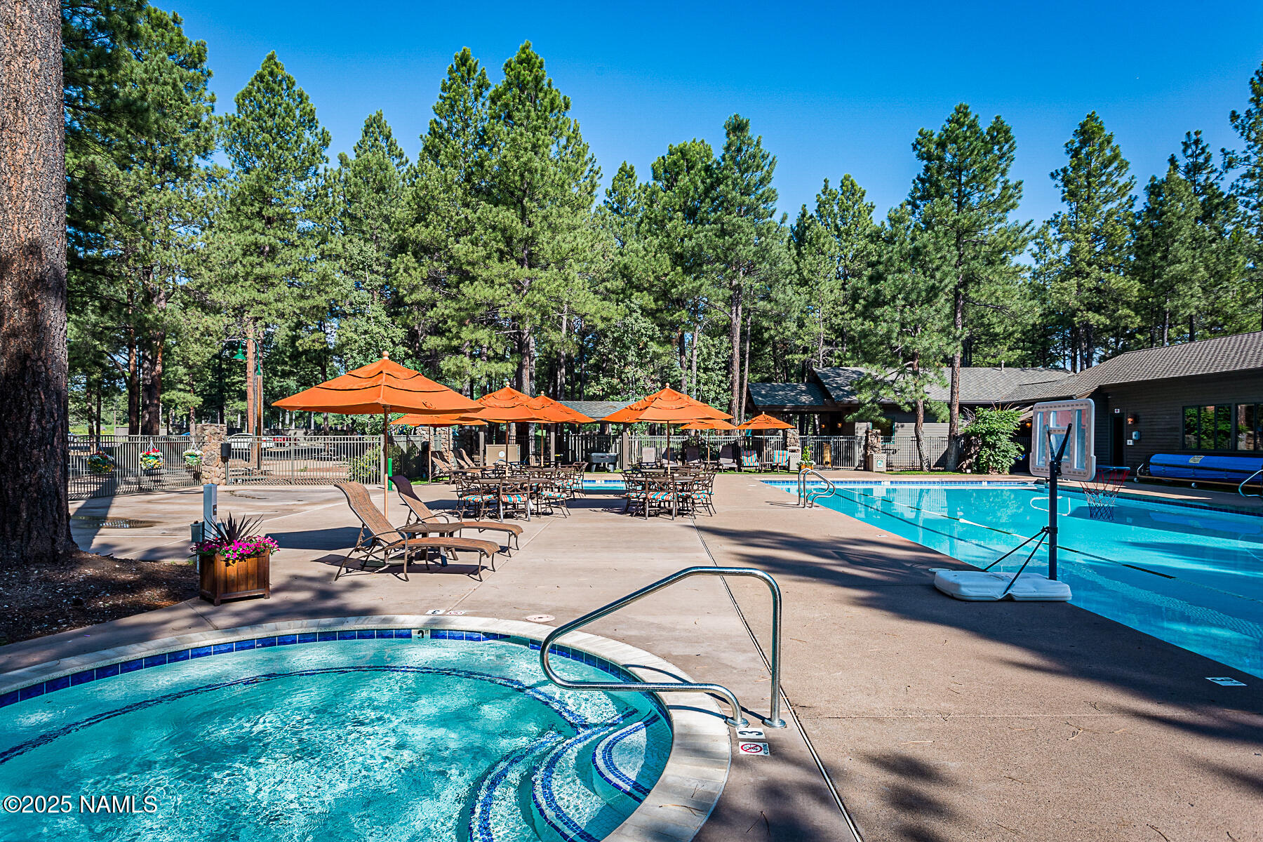 5790 Griffiths Spring Flagstaff, AZ 86005 - Photo 45 of 47 an outdoor space with patio and white umbrellas