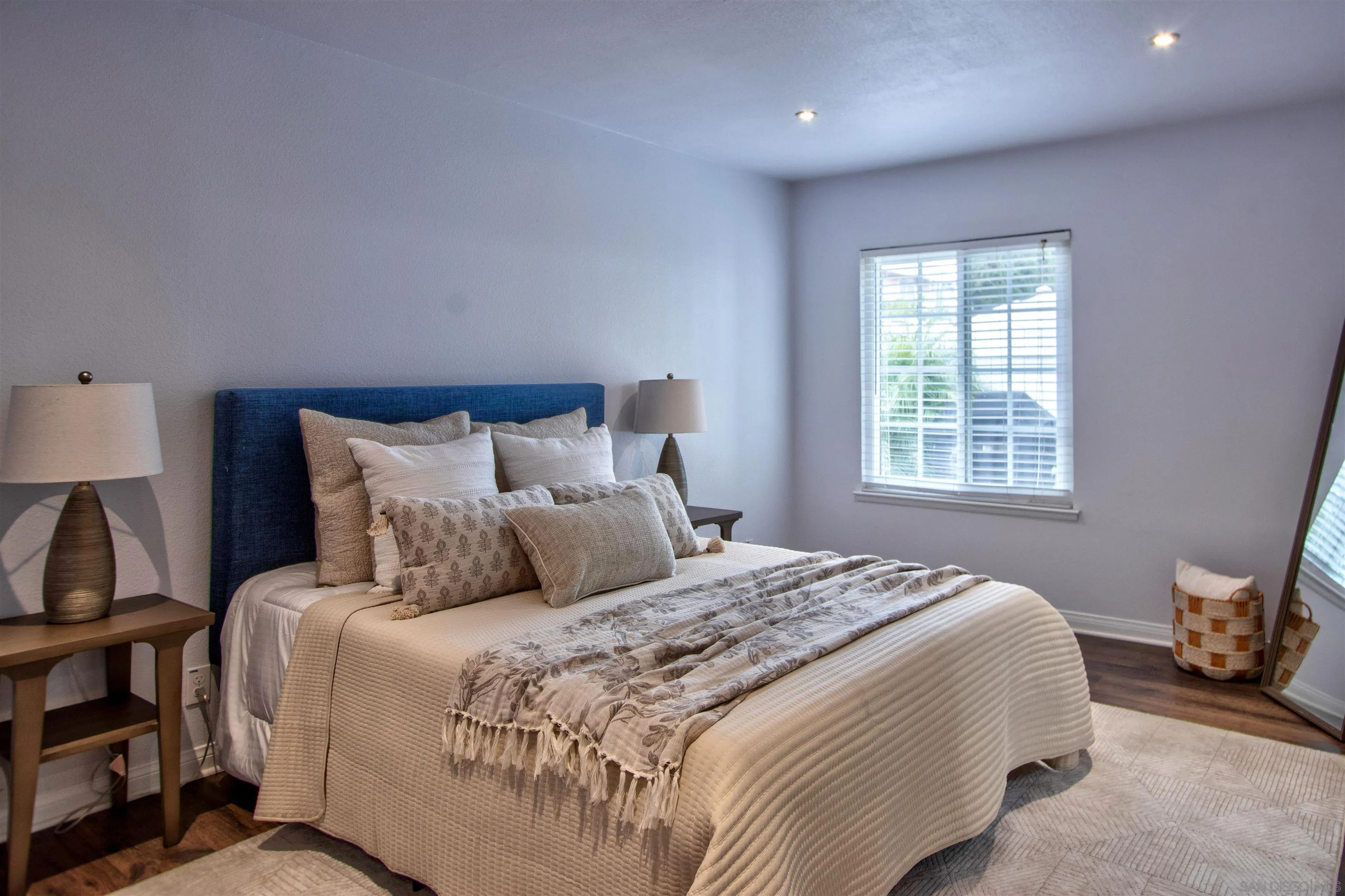 8450 Aries Road San Diego, CA 92126 - Photo 18 of 25 a bedroom with a bed and a window