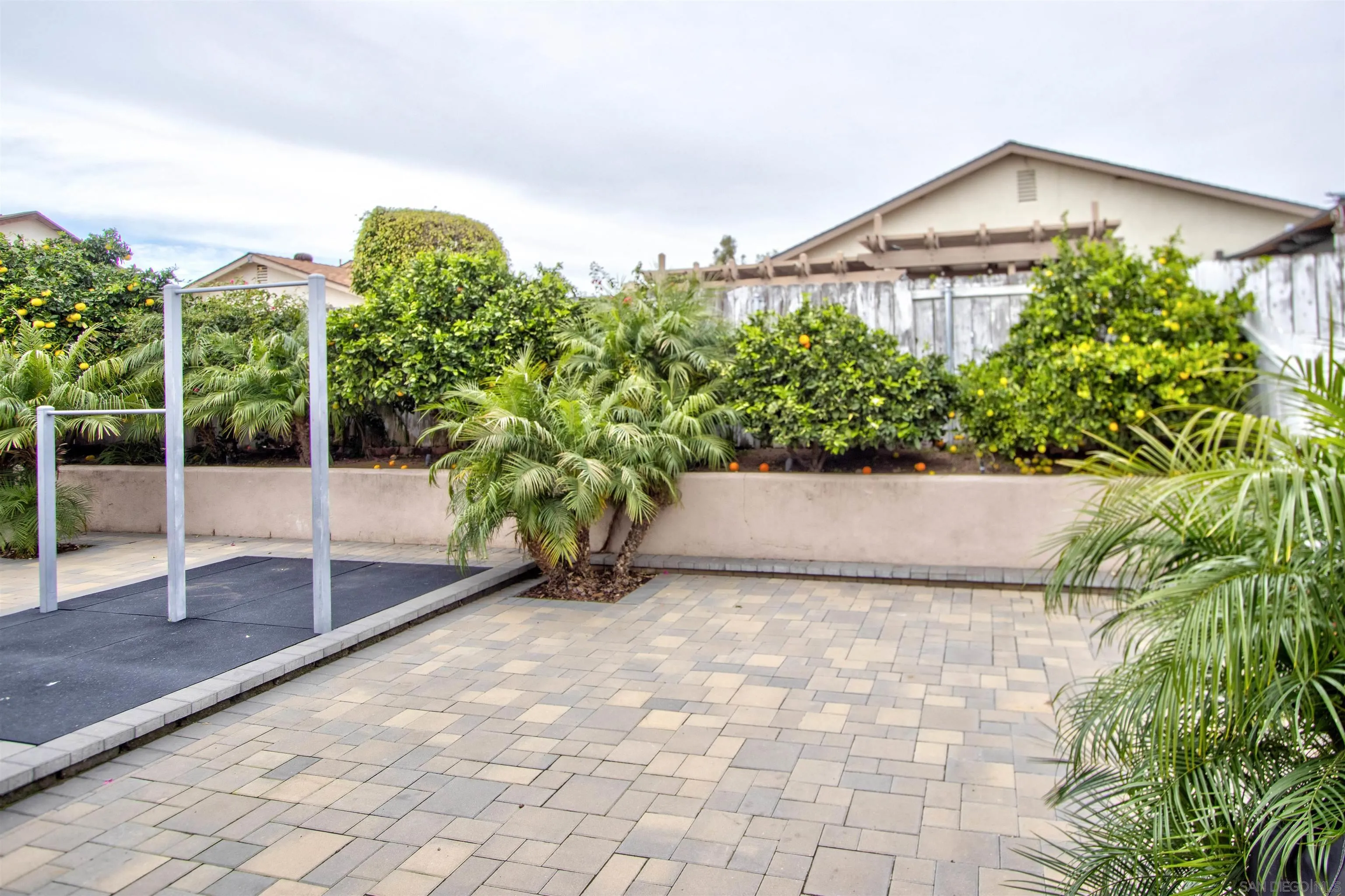 8450 Aries Road San Diego, CA 92126 - Photo 25 of 25 a view of a garden with a bench