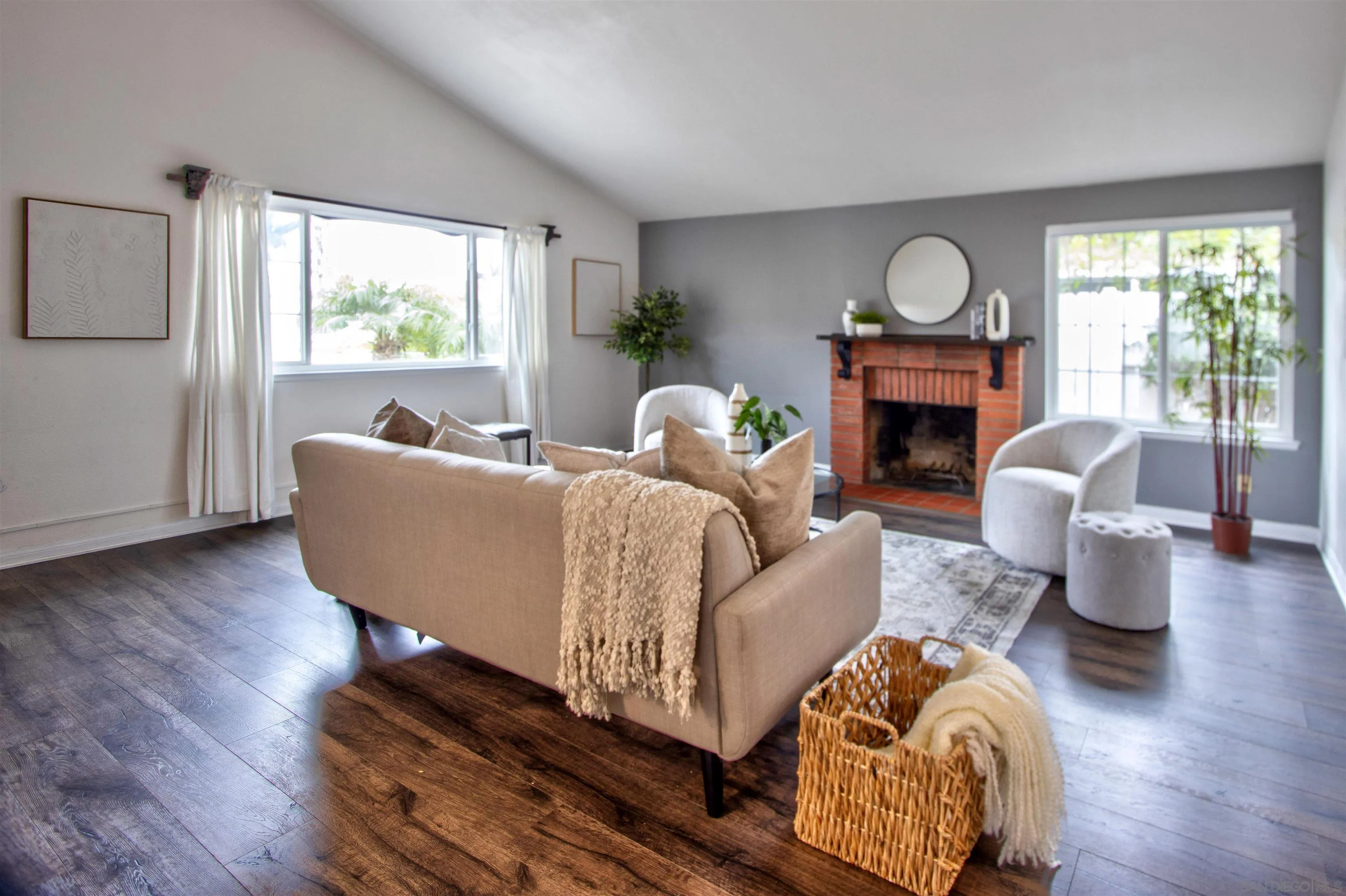 8450 Aries Road San Diego, CA 92126 - Photo 6 of 25 a living room with furniture fireplace and a window
